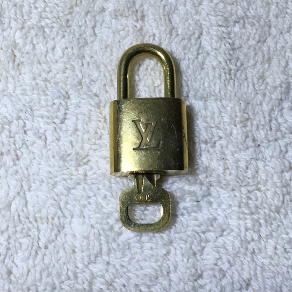 Louis Vuitton Brass '300' Padlock in Goldtone with Goldtone Key—
